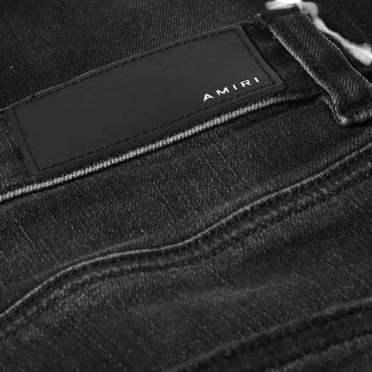 Amiri Stack Jeans "Aged Black"